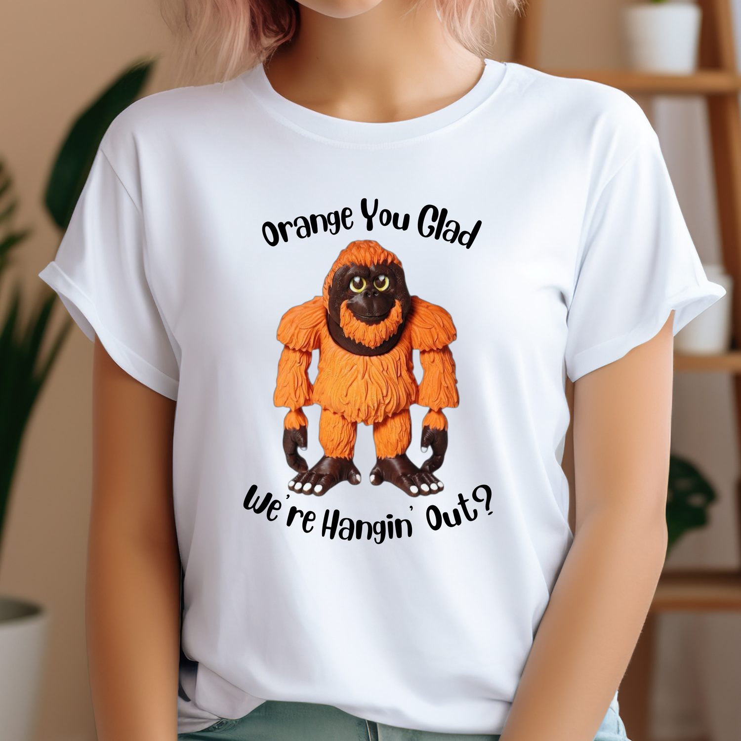 tshirt sporting an orange urangutan with the phrase, orange you glad we're hangin out?