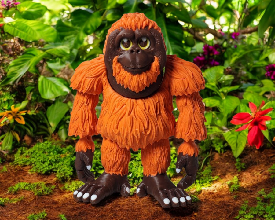 An orange orangutan standing in the forest