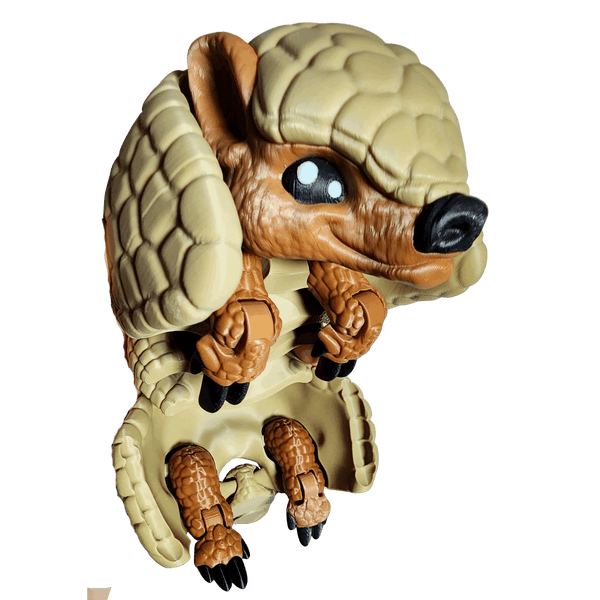 Toy figure of a creature with a shell-like head on a transparent background