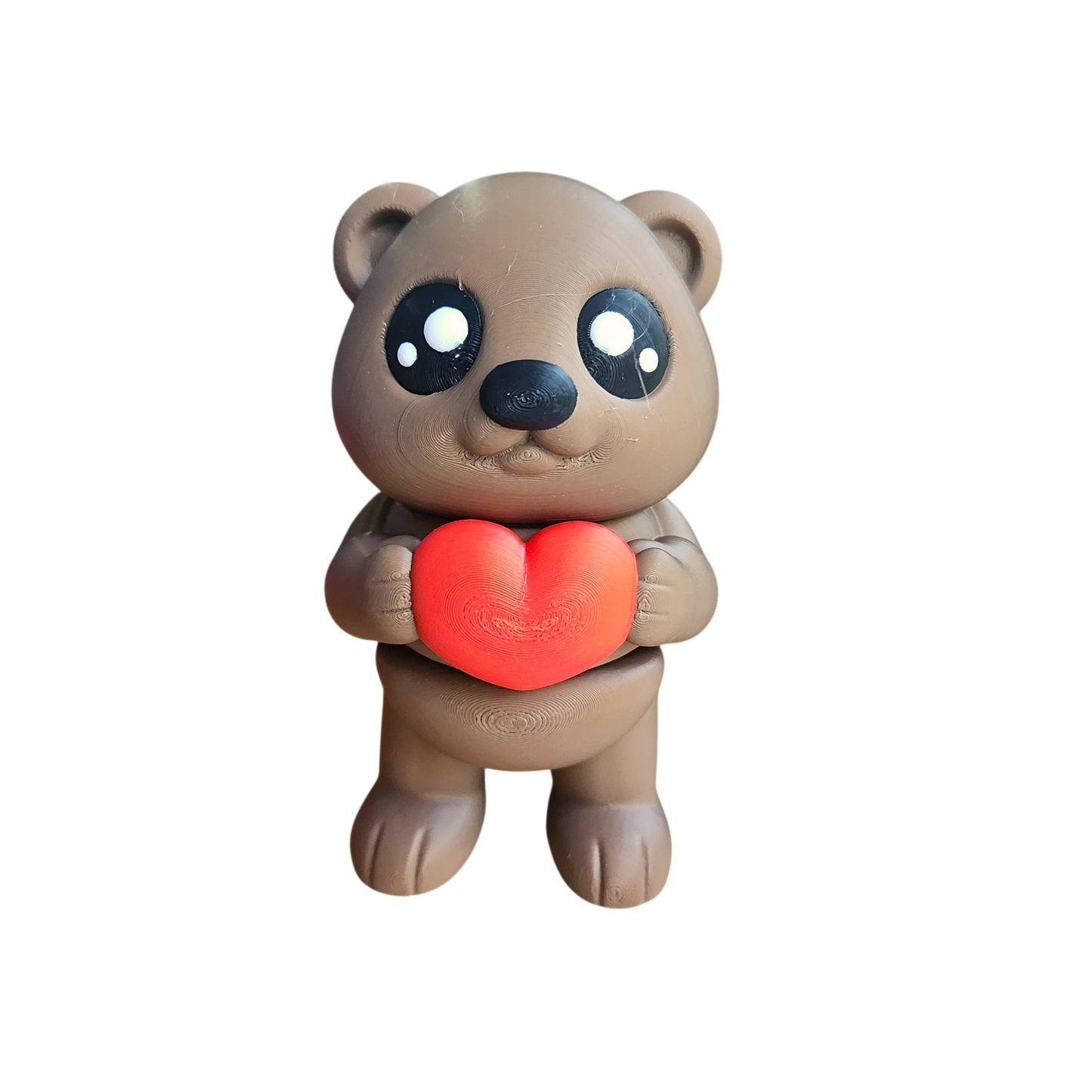 teddy bear holding a heart