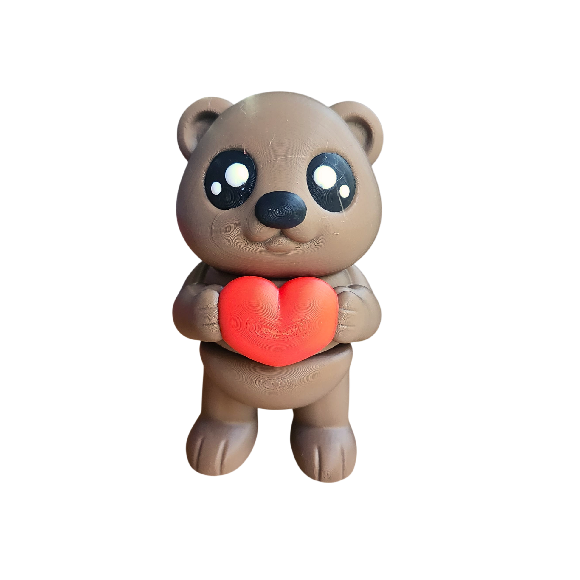 teddy bear holding a heart