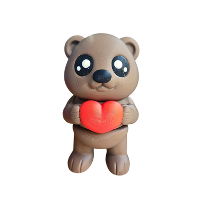 teddy bear holding a heart