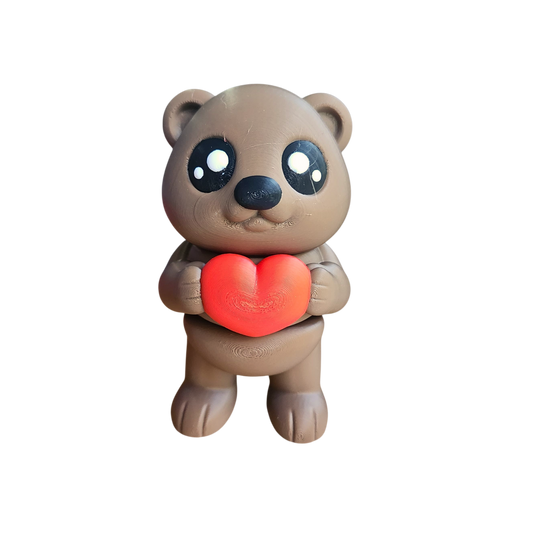 teddy bear holding a heart